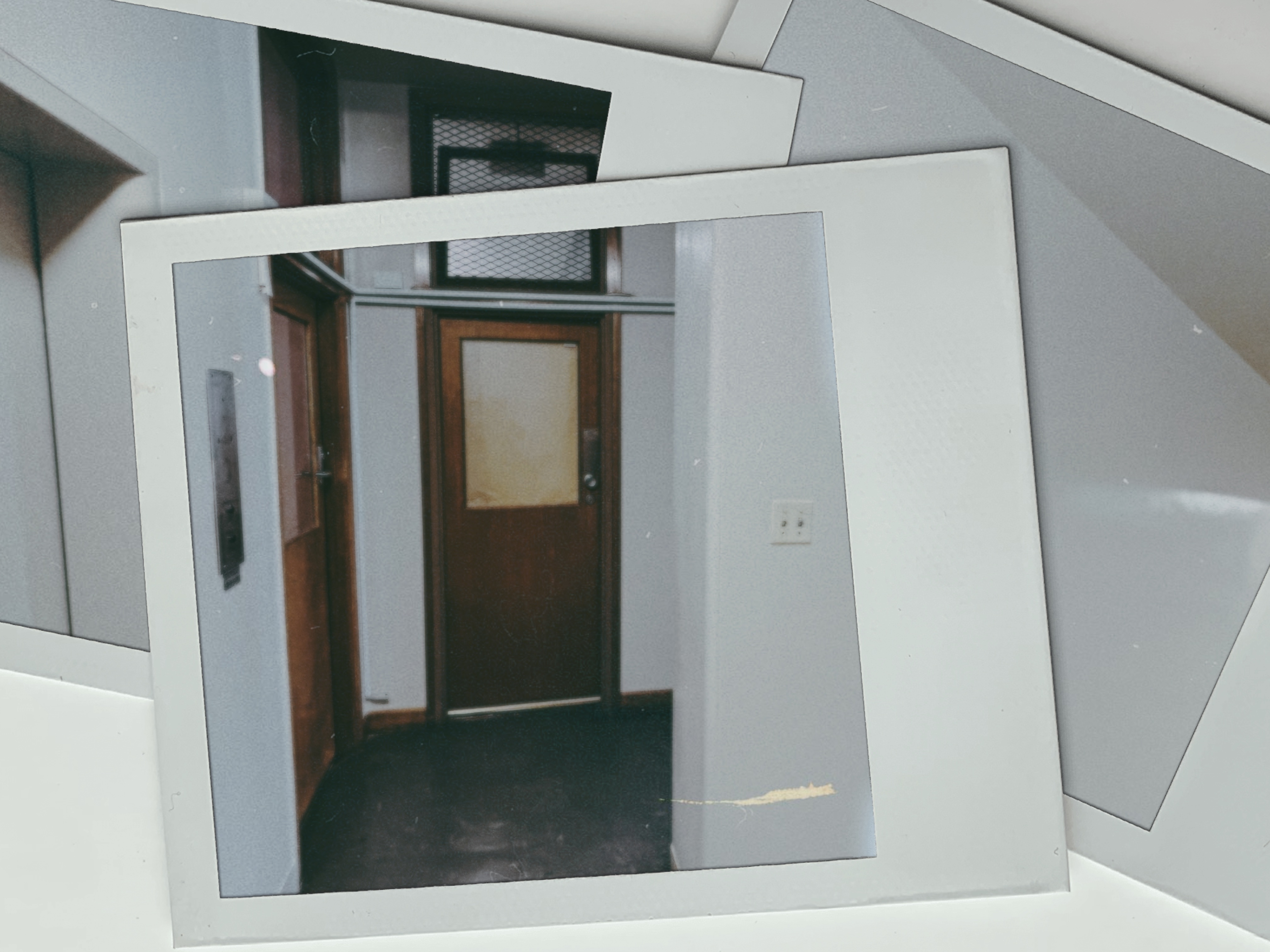 Film print of the doorway to Suite 6 Pink